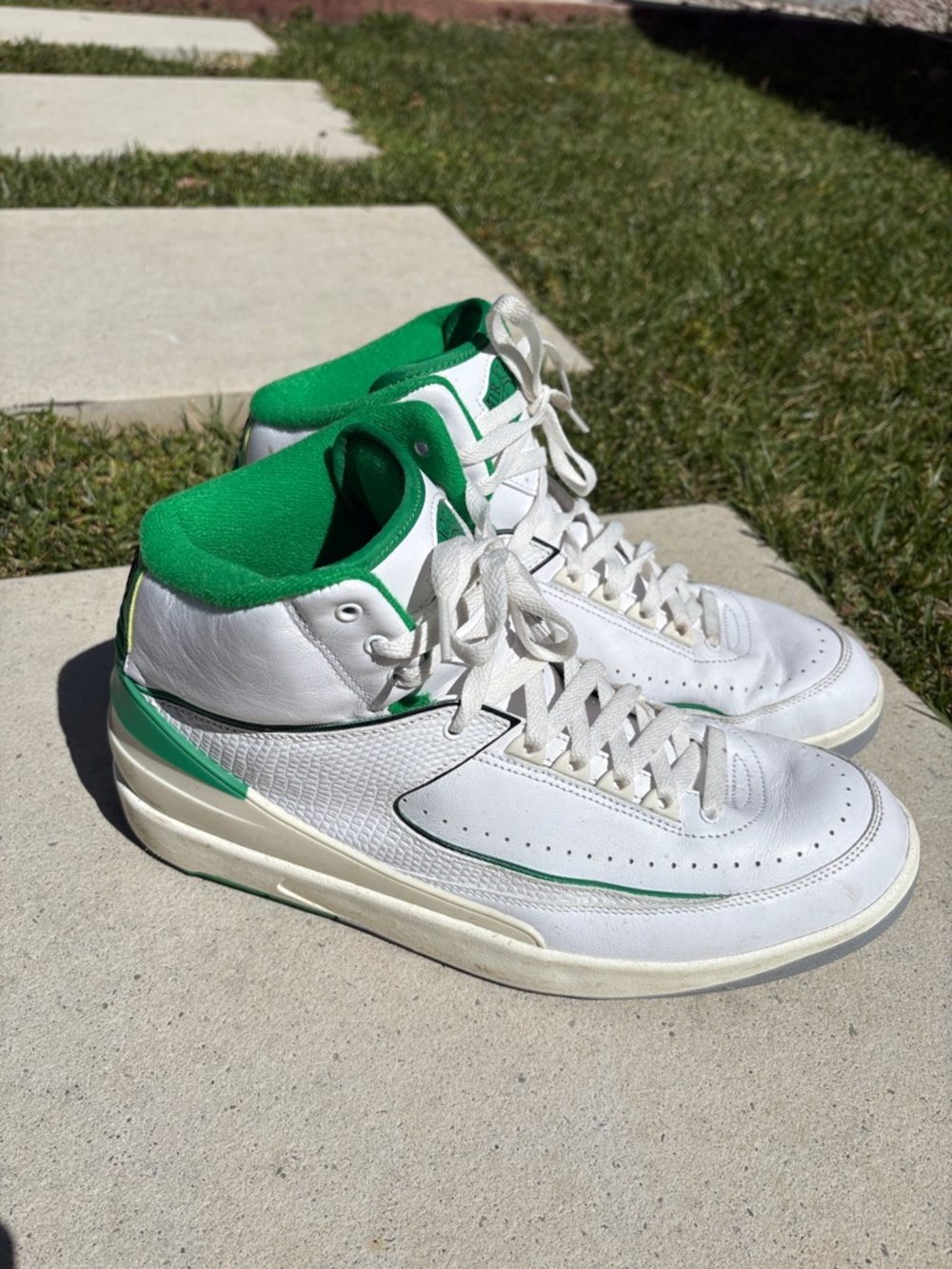Nike Jordan White and Green Mid-Top Sneakers
